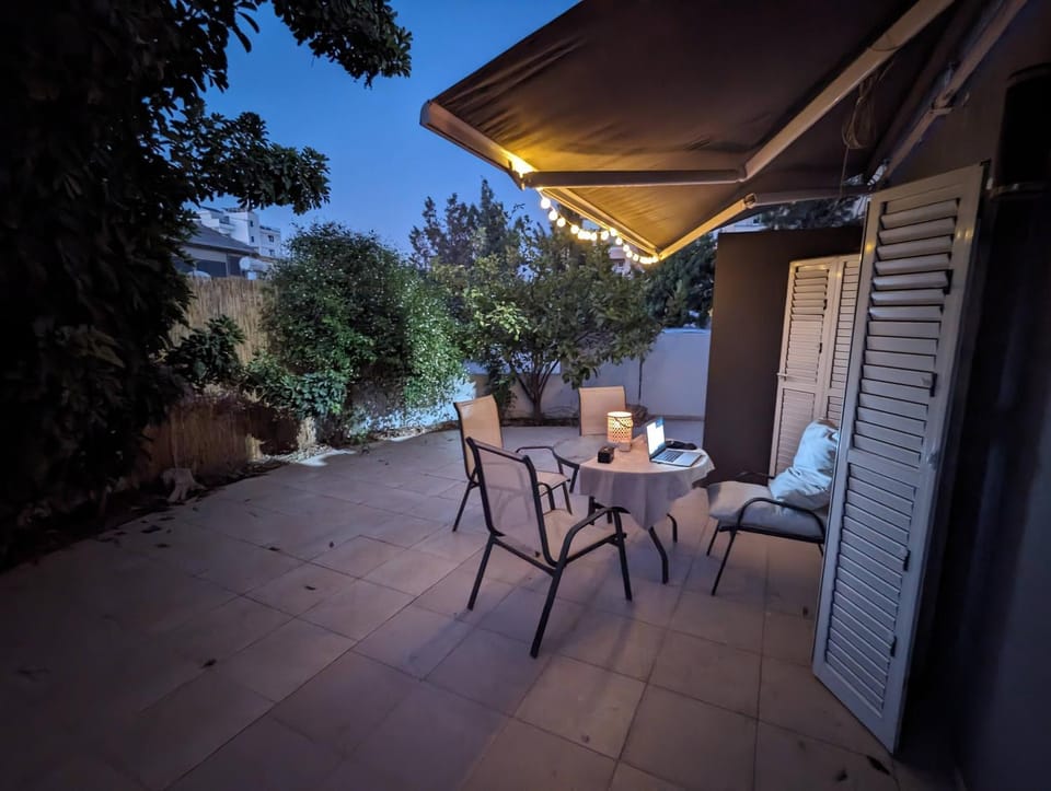 Property building, Patio, Night, Balcony/Terrace, Seating area