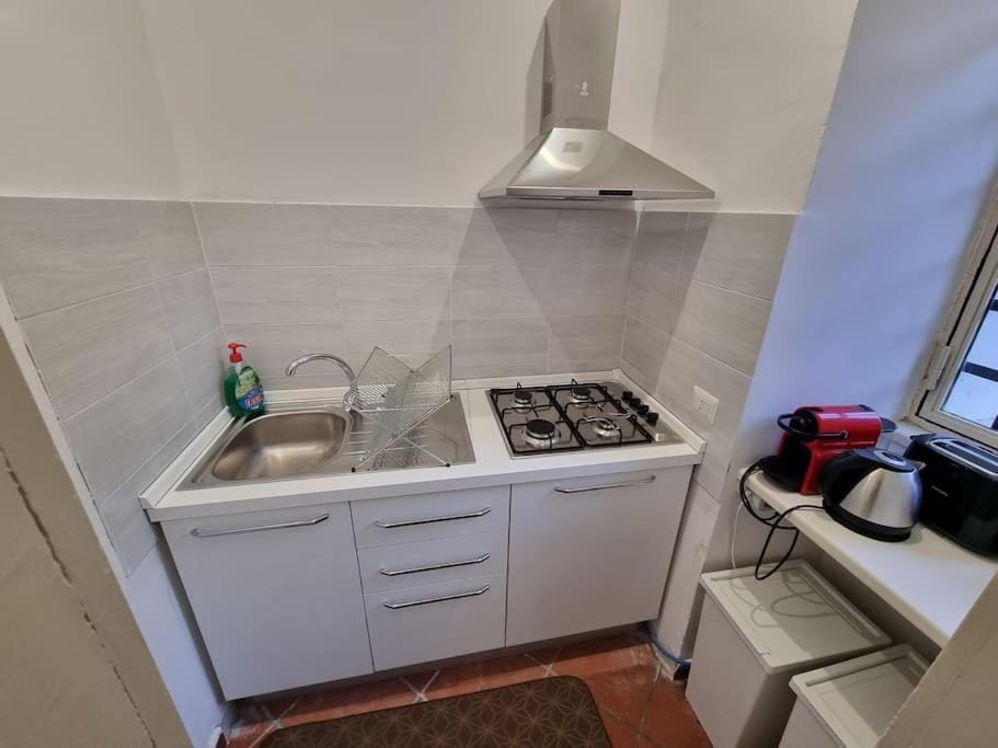 Kitchen or kitchenette, stove