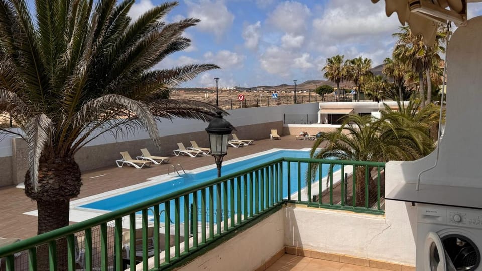 View (from property/room), Balcony/Terrace, Pool view, Swimming pool, sunbed