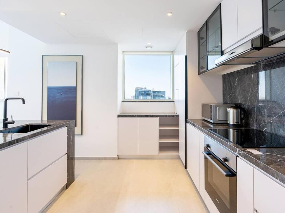 Kitchen or kitchenette, oven, stove