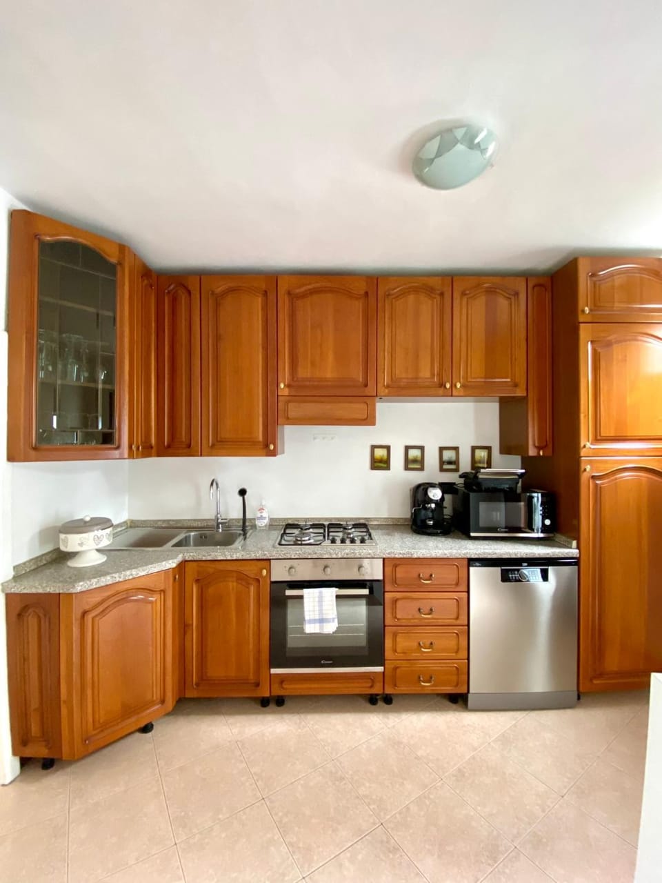 Kitchen or kitchenette, dishwasher, oven, stove, toaster