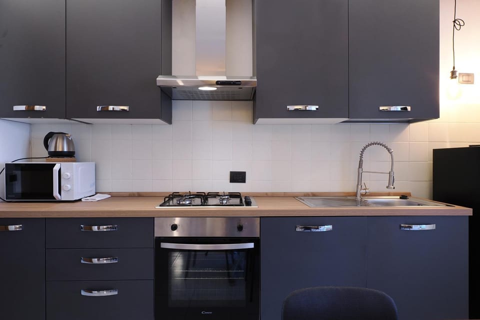 Kitchen or kitchenette, oven, stove