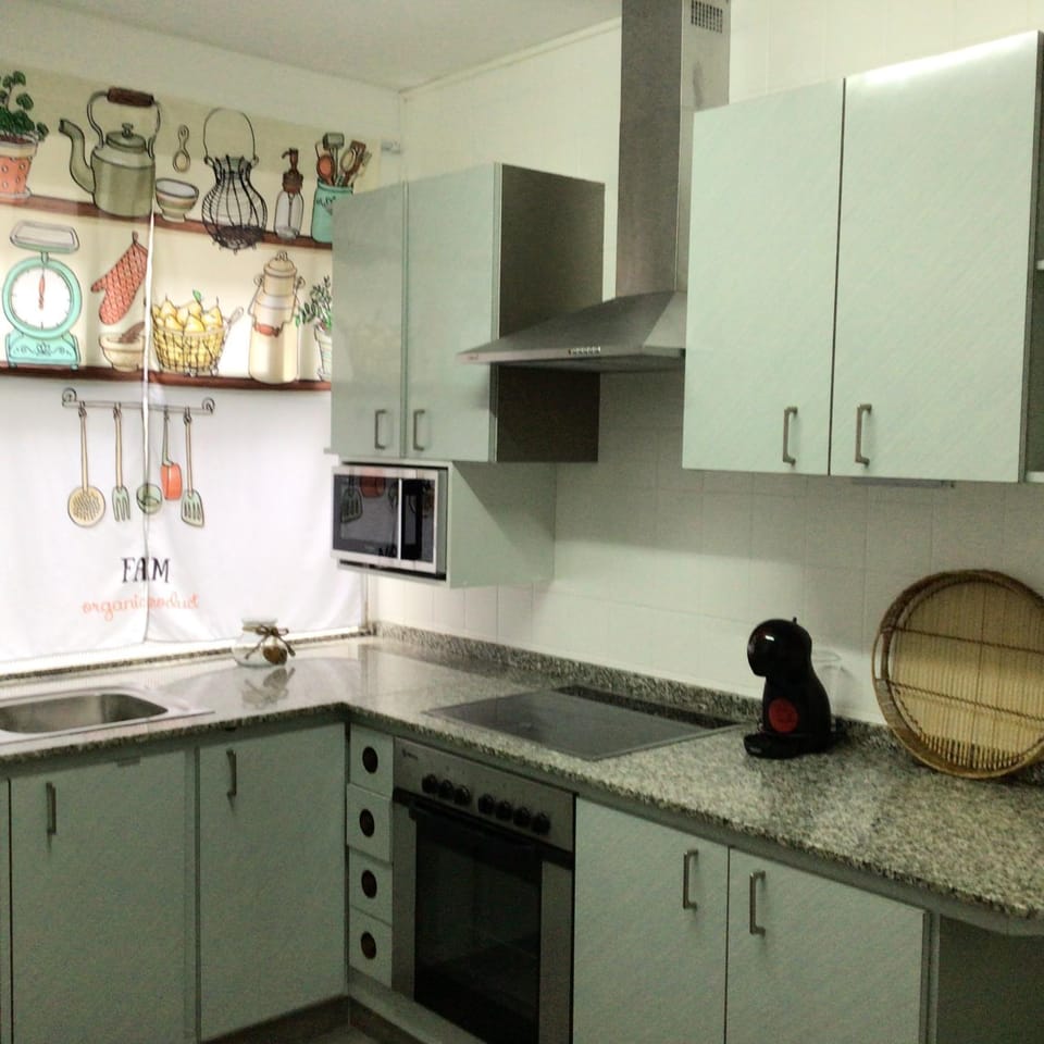 Kitchen or kitchenette, stove