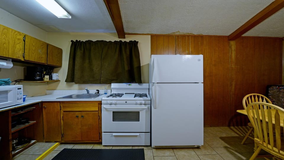 Kitchen or kitchenette, microwave, oven, stove, kitchen