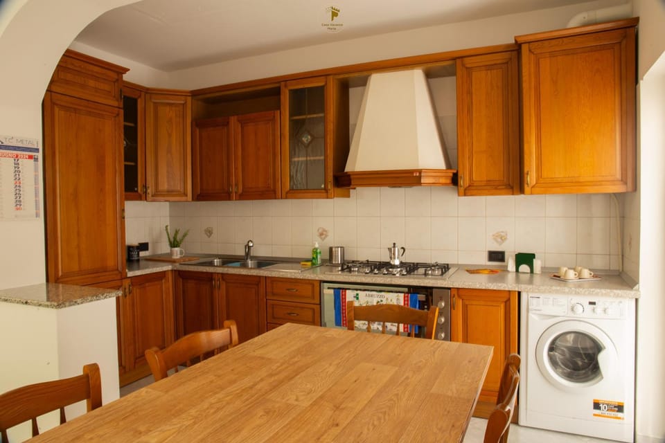 Kitchen or kitchenette, Dining area, oven, washing machine