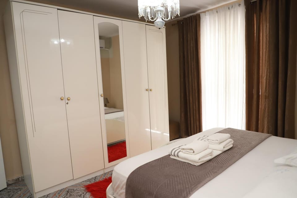 Bed, Photo of the whole room, Bedroom, towels, wardrobe