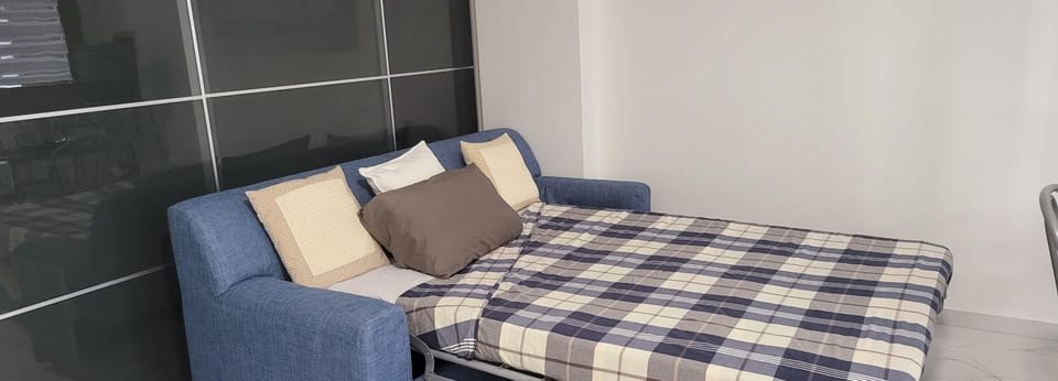 Bed, Living room, Seating area