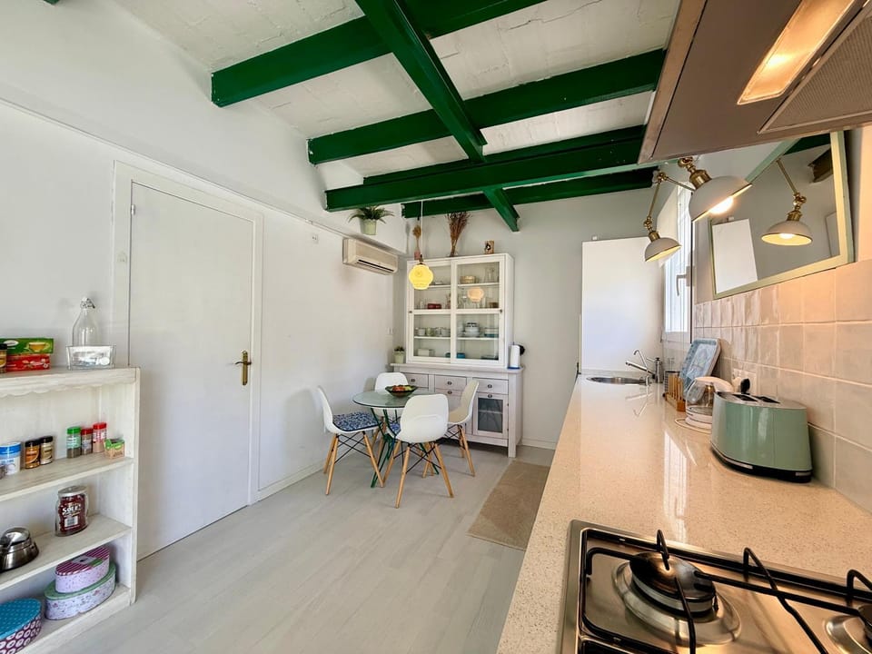 Kitchen or kitchenette, Dining area, dishwasher, microwave, oven, stove, air conditioner
