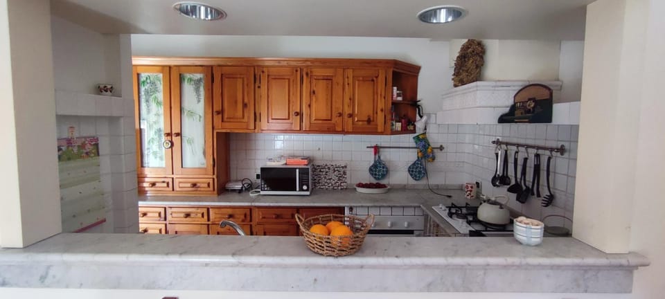Kitchen or kitchenette, stove, toaster