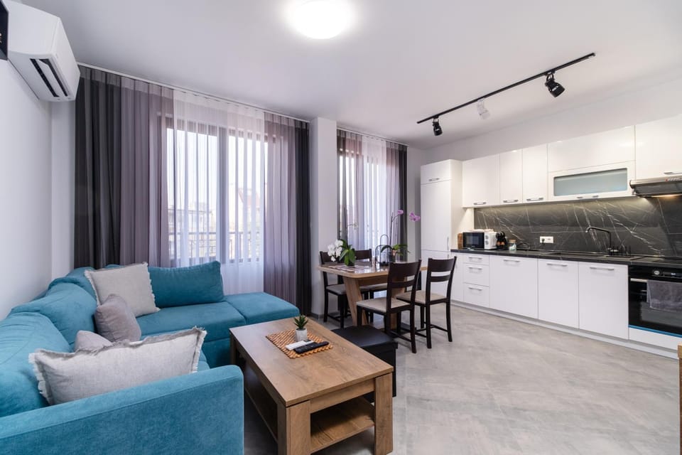 Kitchen or kitchenette, Living room, Seating area, Dining area