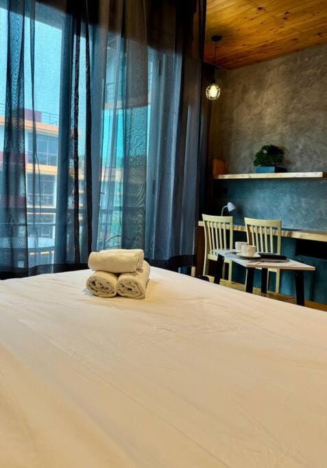 Mira Naiharn, Minimalist Design & Mountain View at Relife Windy Apartment in Rawai
