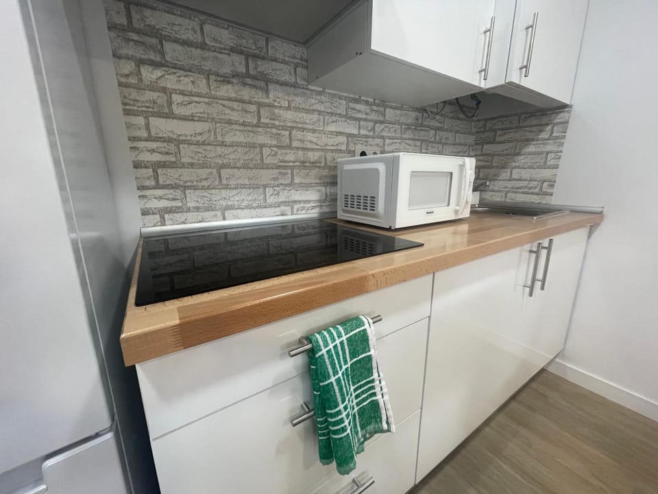 Kitchen or kitchenette, stove