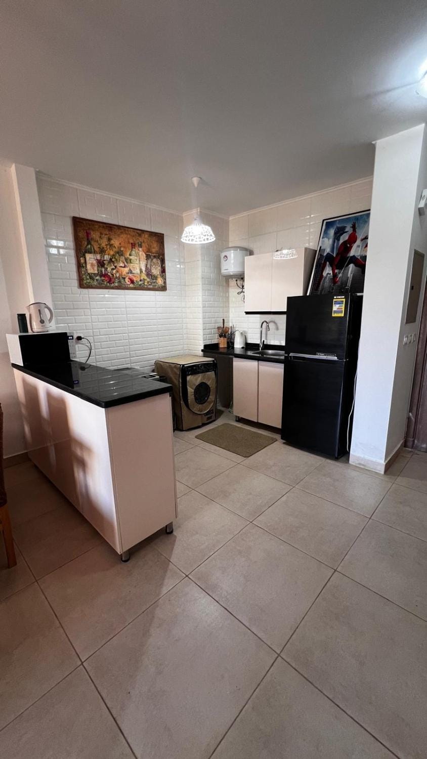 Kitchen or kitchenette, Communal kitchen, microwave, oven, stove, kitchen