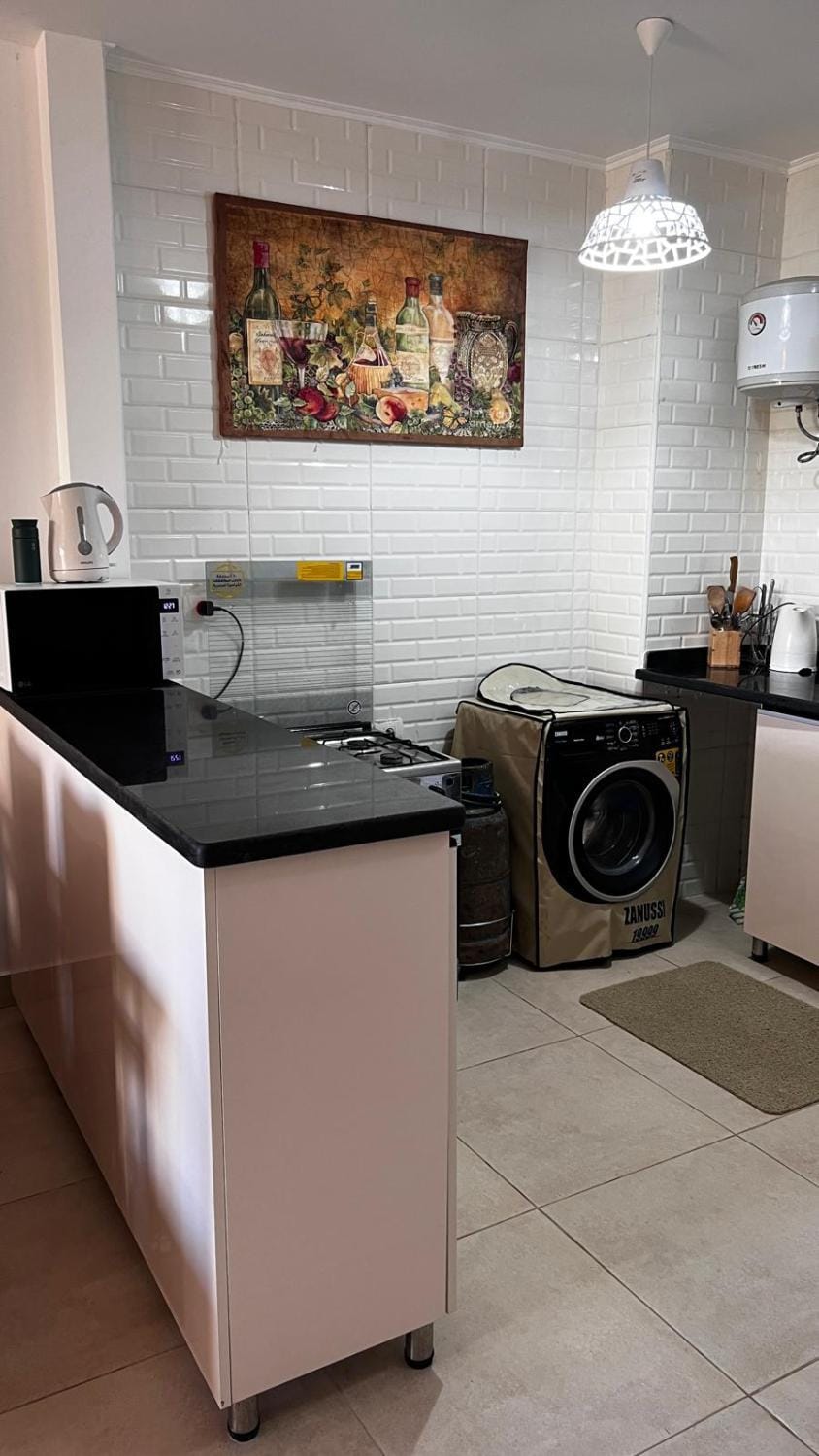 Kitchen or kitchenette, oven, stove