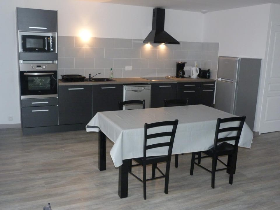 Dining area, dishwasher, oven, stove
