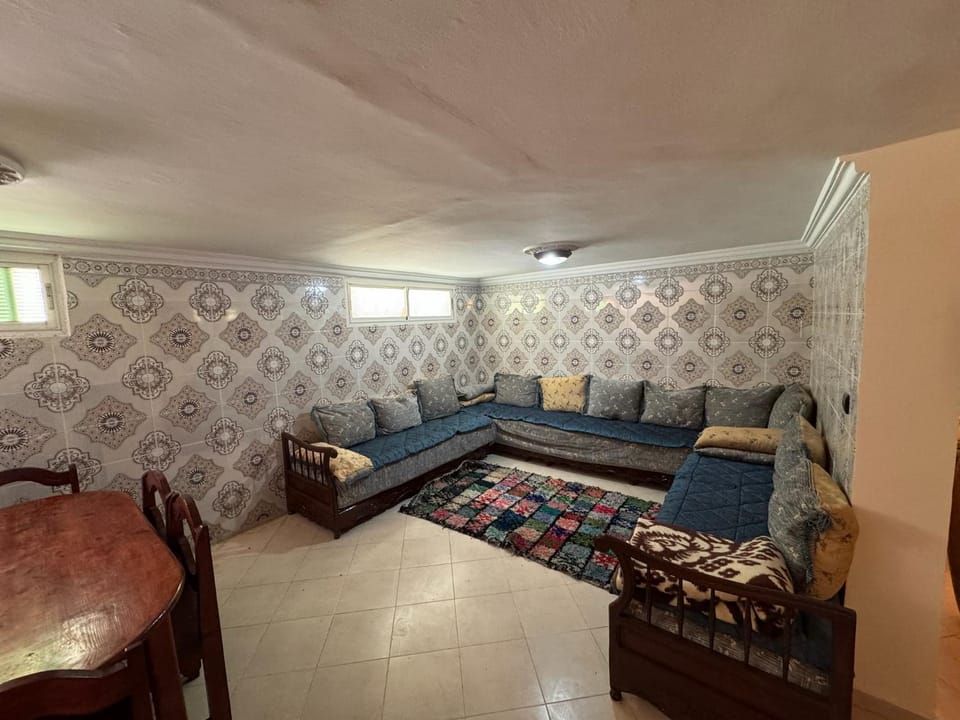 Bed, Living room, Seating area