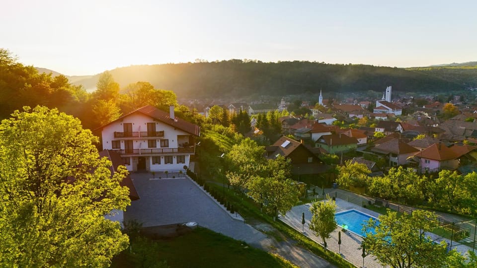 Property building, Natural landscape, Bird's eye view, Pool view, Swimming pool, Sunset