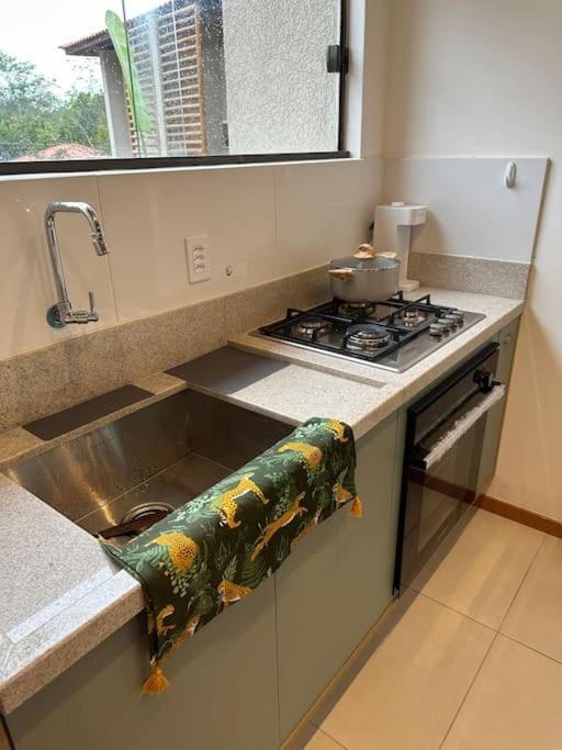 Kitchen or kitchenette, stove