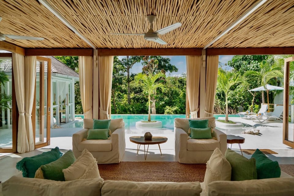 Living room, Seating area, Pool view