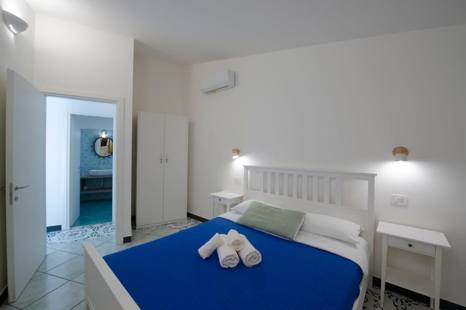 Bed, Photo of the whole room, Bedroom, towels, air conditioner
