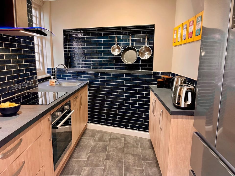 Kitchen or kitchenette, oven, stove, toaster