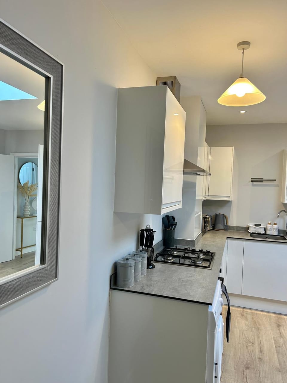 Kitchen or kitchenette, Dining area, microwave, oven, toaster, washing machine