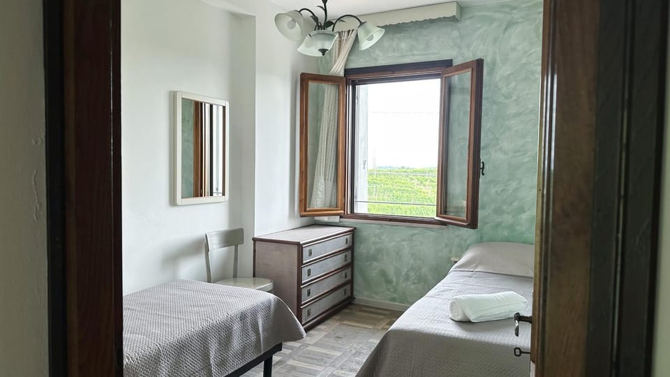 Bed, Photo of the whole room, Bedroom, towels, air conditioner