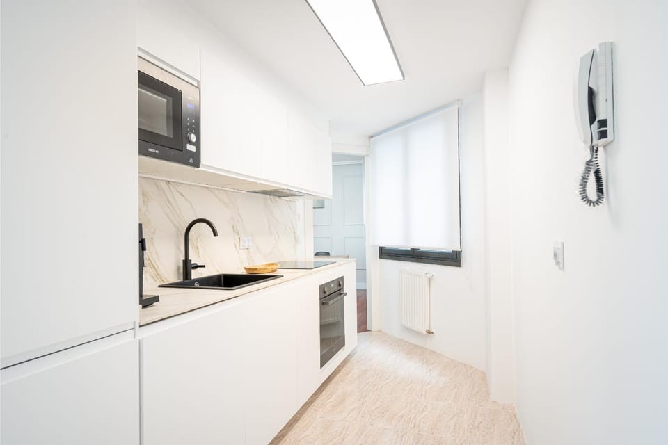 Kitchen or kitchenette, oven