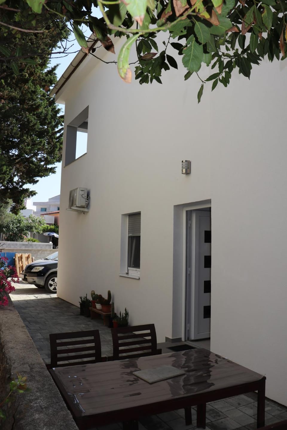 Property building, Patio, Day, Seating area