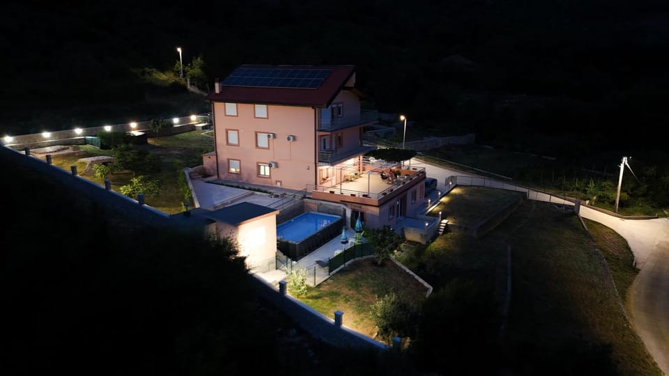 Property building, Night, Natural landscape, Garden, Parking