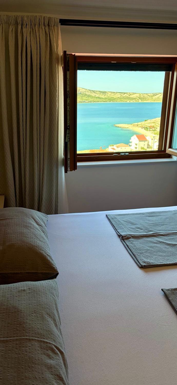 Bed, Natural landscape, Bedroom, Sea view