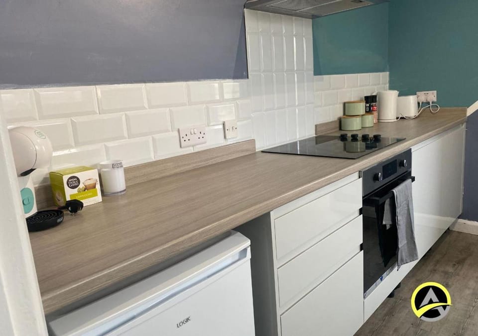 Kitchen or kitchenette, oven, stove
