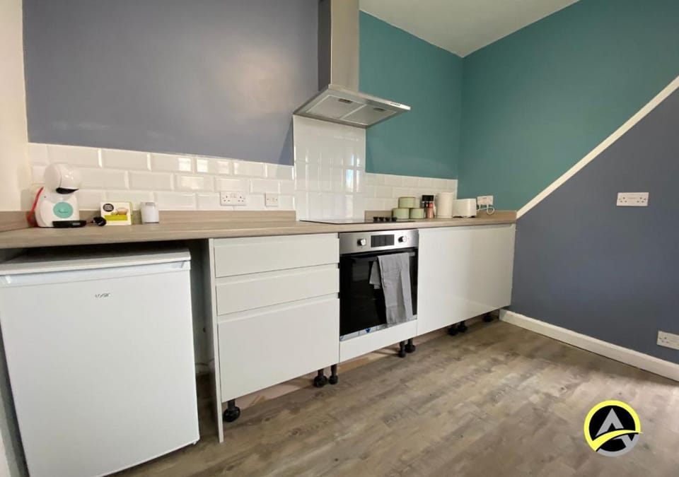 Kitchen or kitchenette, oven, stove, toaster