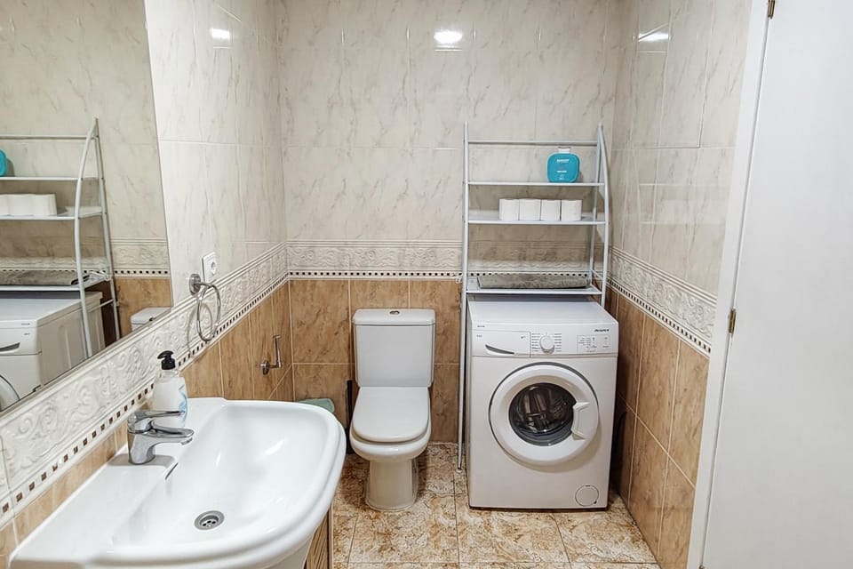 Bathroom, towels, washing machine