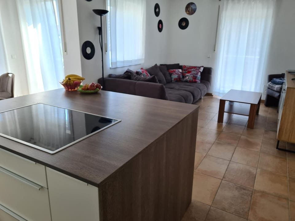 Kitchen or kitchenette, Living room, Seating area, stove