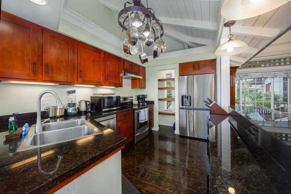 Kitchen or kitchenette, dishwasher, oven, stove