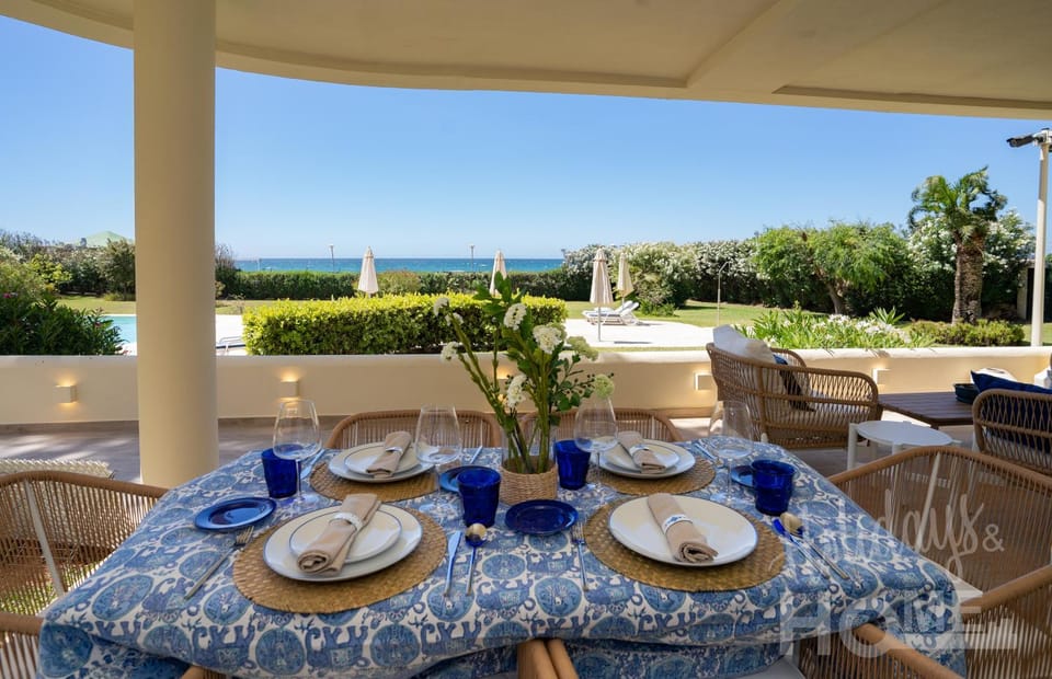 Holidays & Home Beachfront Neptuno III , sea views,and garden,Elviria Apartment in Marbella