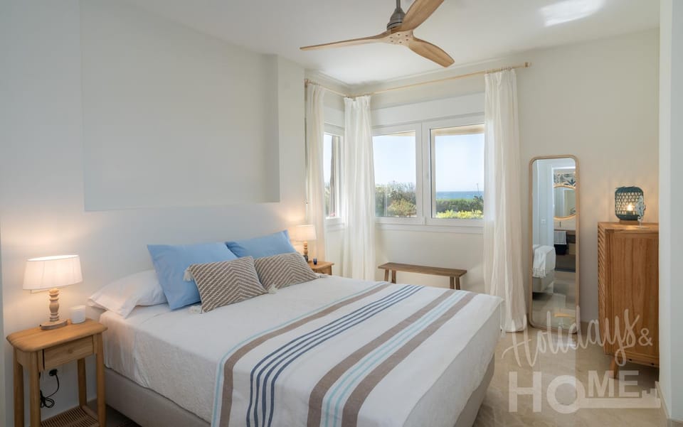 Holidays & Home Beachfront Neptuno III , sea views,and garden,Elviria Apartment in Marbella