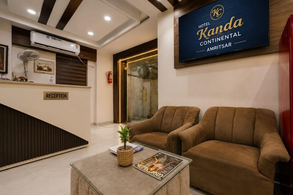 Property logo or sign, Library, TV and multimedia, Living room, Lobby or reception, Seating area, Logo/Certificate/Sign, Certificate/Award, air conditioner
