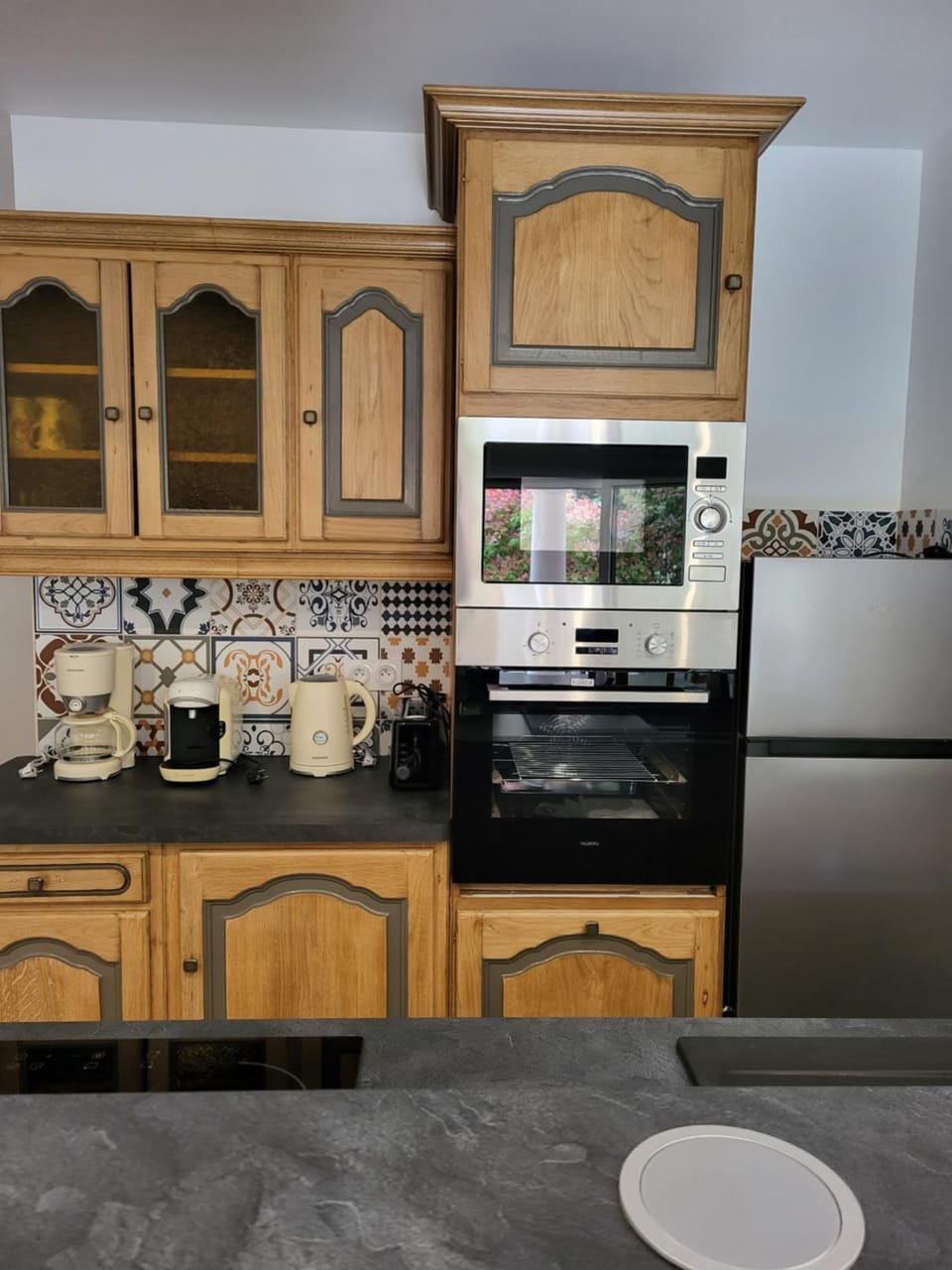 Kitchen or kitchenette, dishwasher, oven, stove, toaster