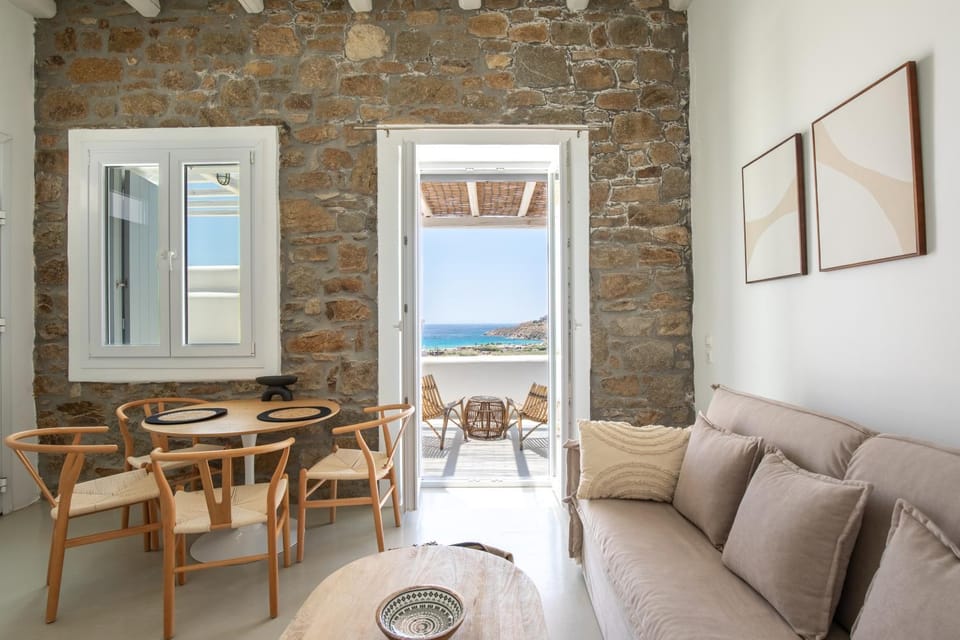 Natural landscape, Living room, Seating area, Dining area, Sea view