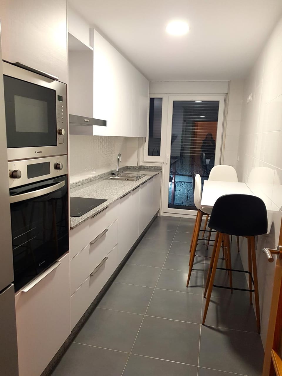 Kitchen or kitchenette, oven, stove