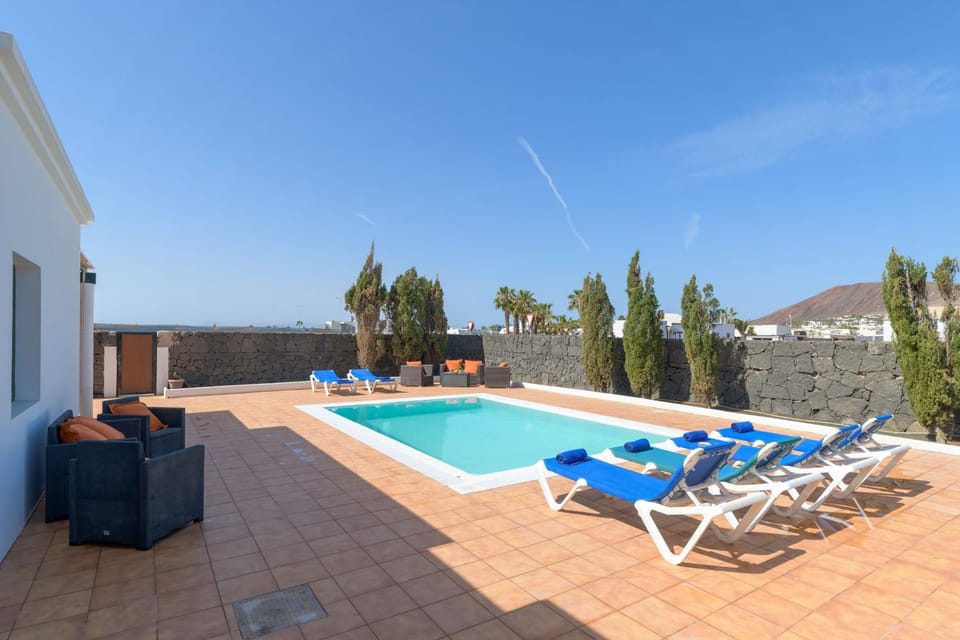 Property building, Living room, Swimming pool