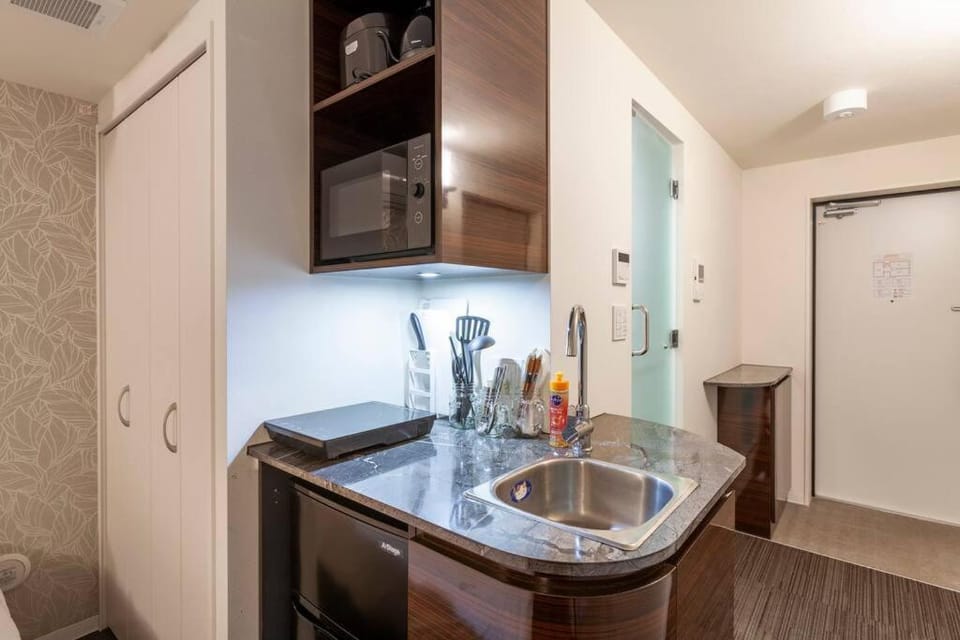 Kitchen or kitchenette, microwave