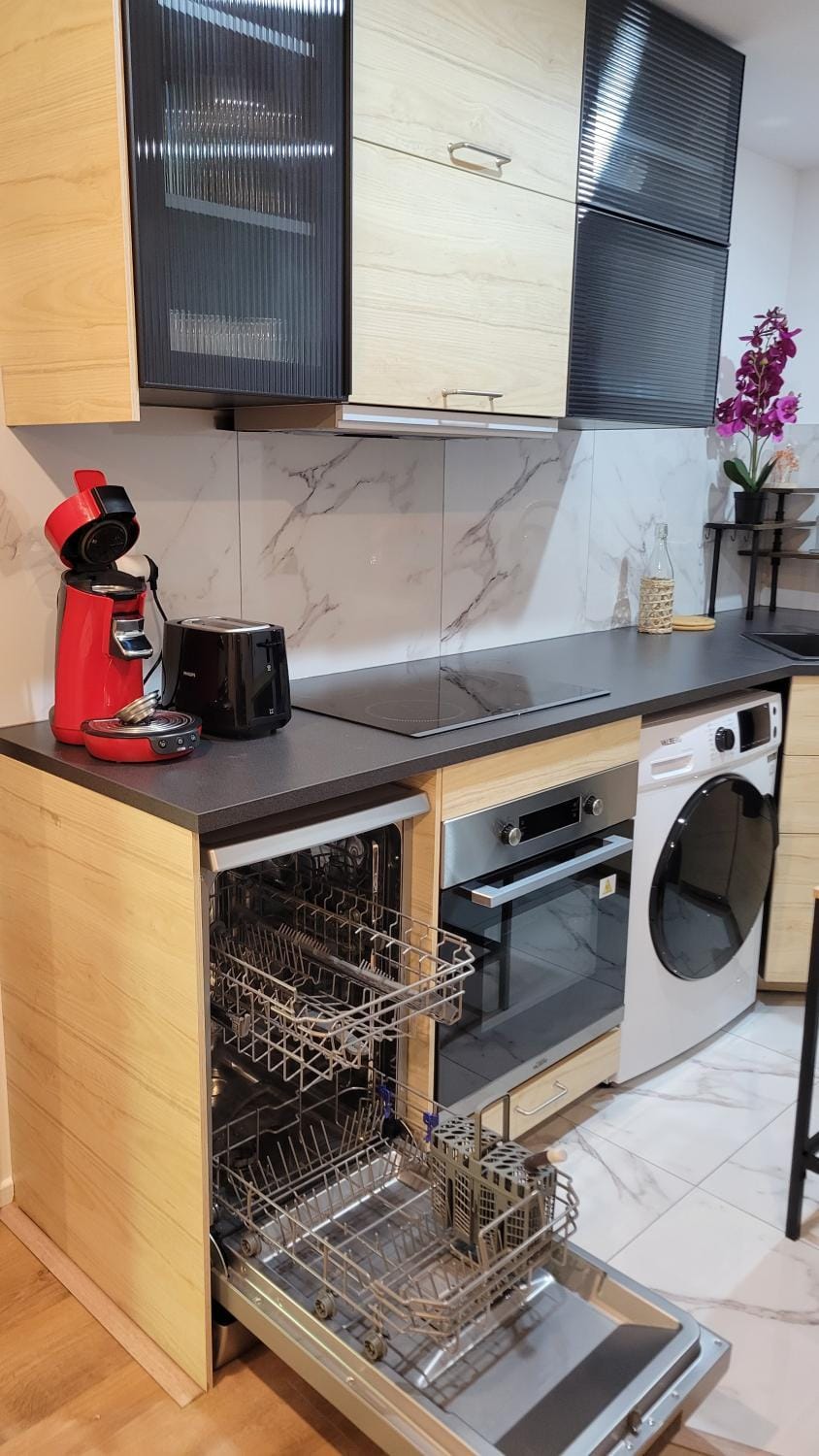 Kitchen or kitchenette, dishwasher, oven, stove, toaster