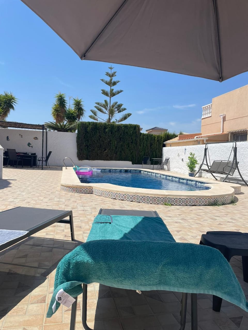 Swimming pool, sunbed