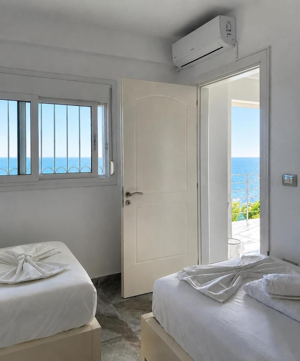 Bed, View (from property/room), Sea view, Family, furniture, towels, air conditioner