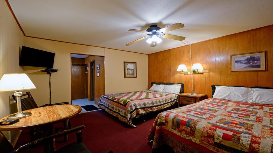 Bed, TV and multimedia, Seating area, Bedroom, furniture, air conditioner