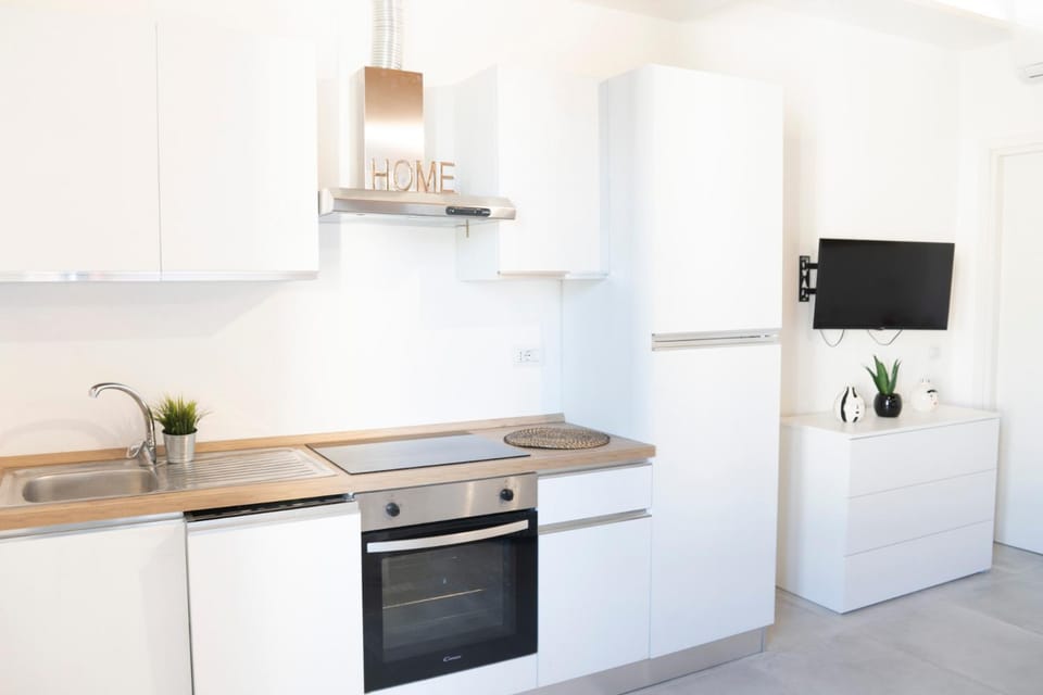 Kitchen or kitchenette, oven, stove