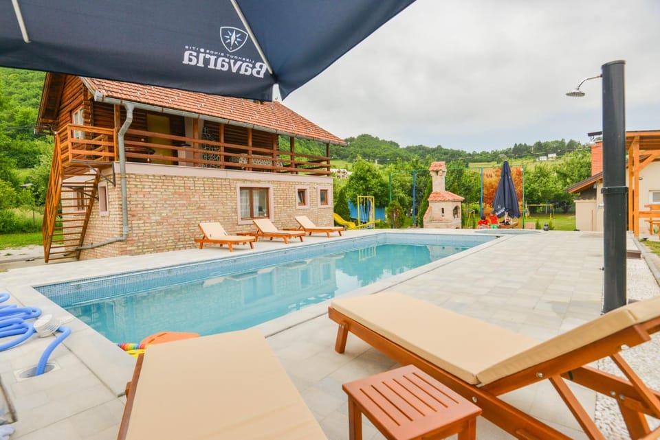 Patio, Day, Natural landscape, Mountain view, Pool view, Swimming pool, sunbed